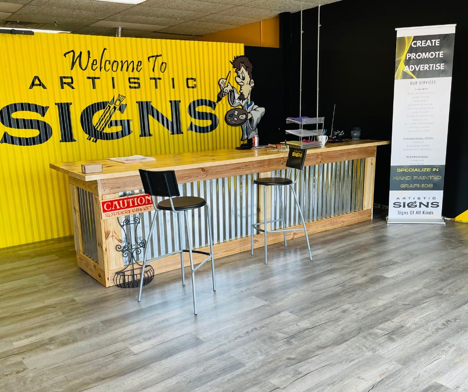 Our Story and Foot Print with Signs and Custom Apparel